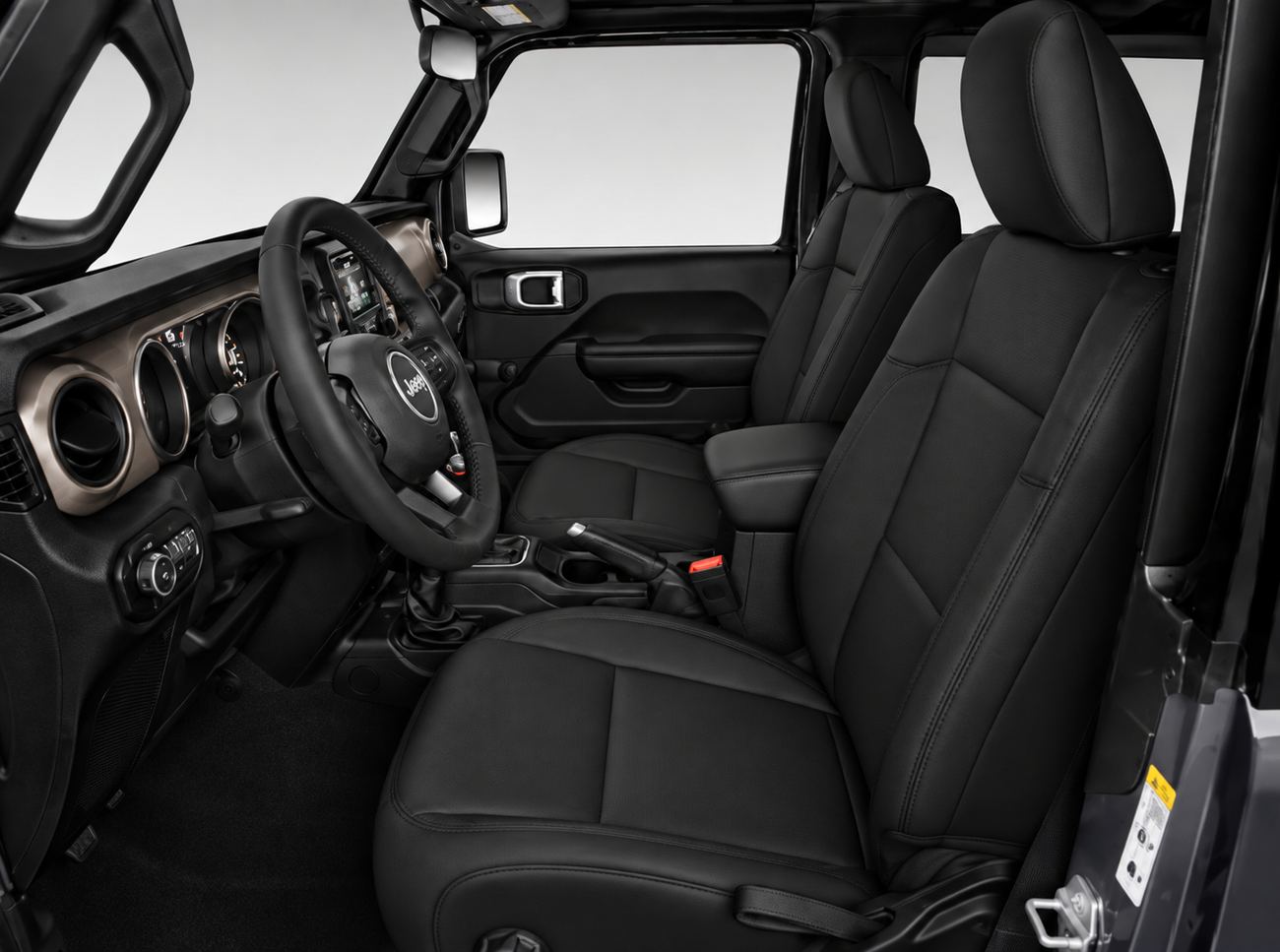 Black leather upholstery shown in a 2020 Jeep Wrangler JL four-door interior